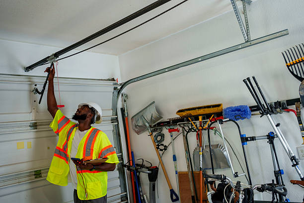 Professional Garage Door Panel Replacement technician working in Warren County County, PA